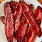 Some slices of microwaved turkey bacon
